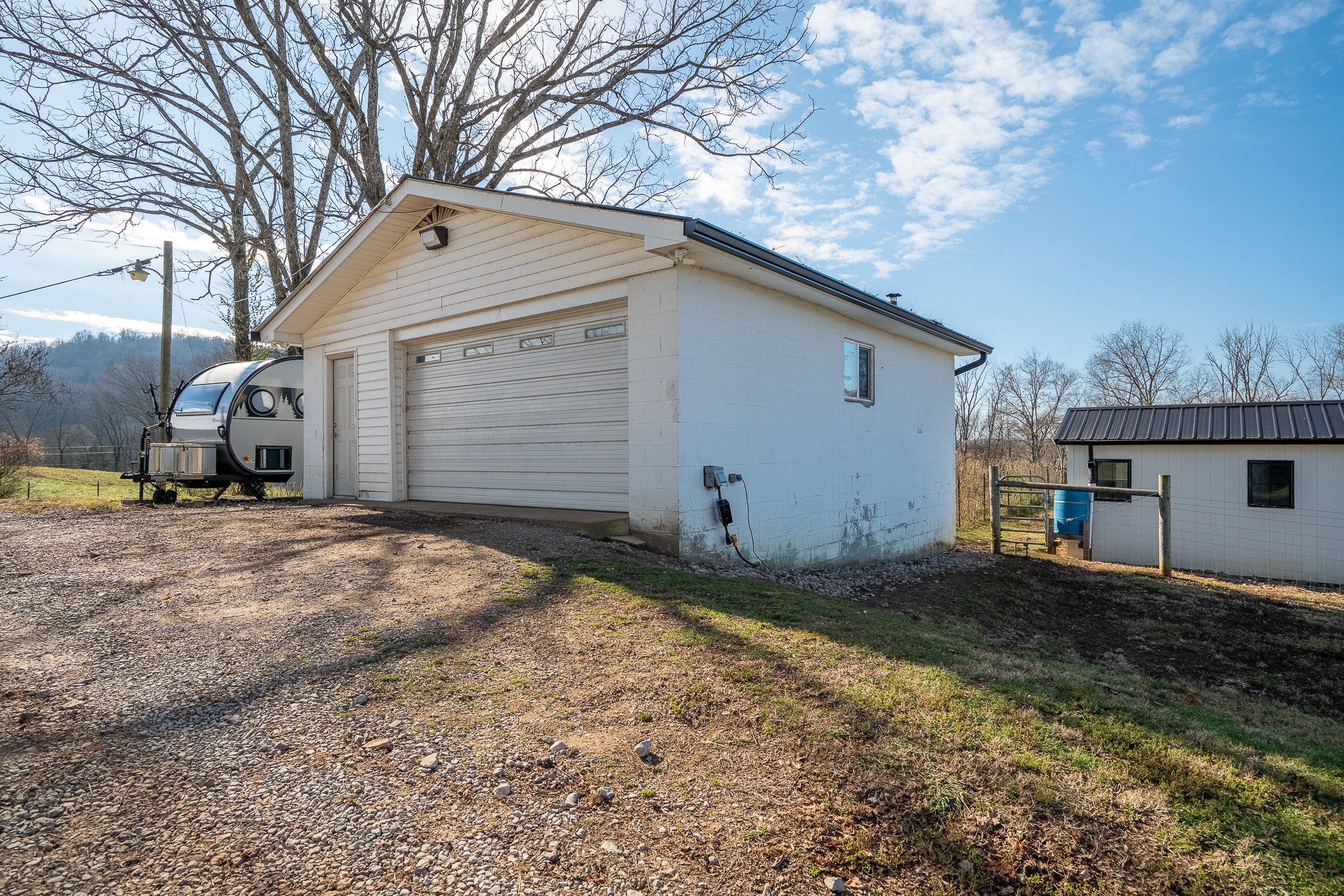1545 Blue Springs Road Sparta, TN 38583 - Photo 78 of 99 a view of a house with a yard and garage