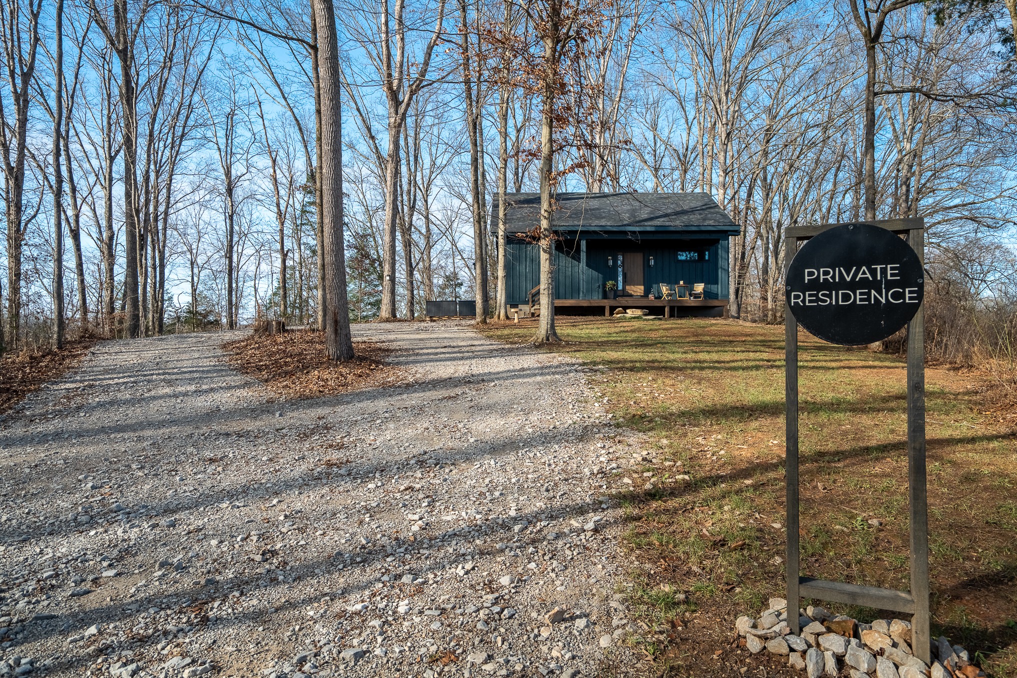 1545 Blue Springs Road Sparta, TN 38583 - Photo 8 of 99 a view of a entrance gate of the house and trees