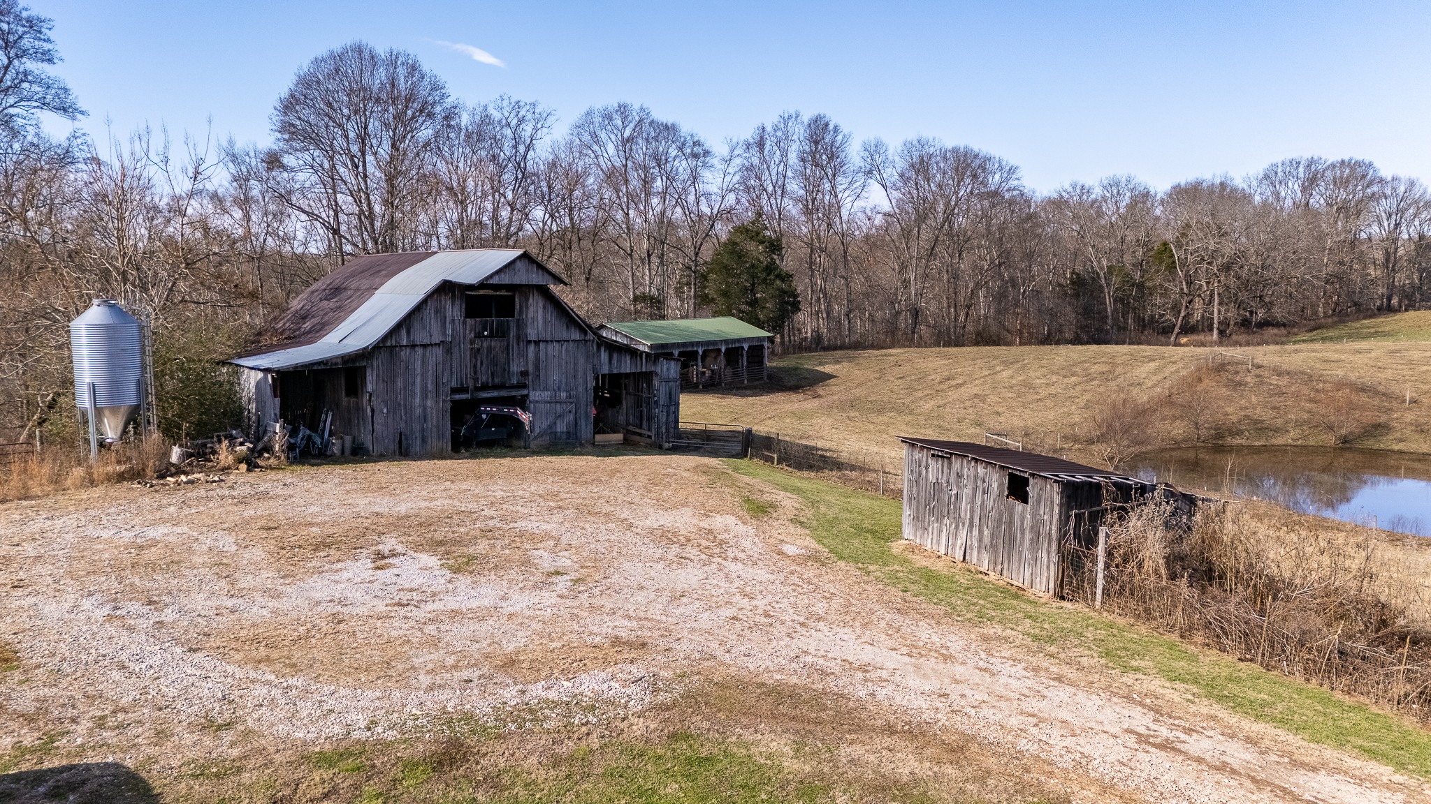1545 Blue Springs Road Sparta, TN 38583 - Photo 89 of 99 a view of a house with a yard covered in snow