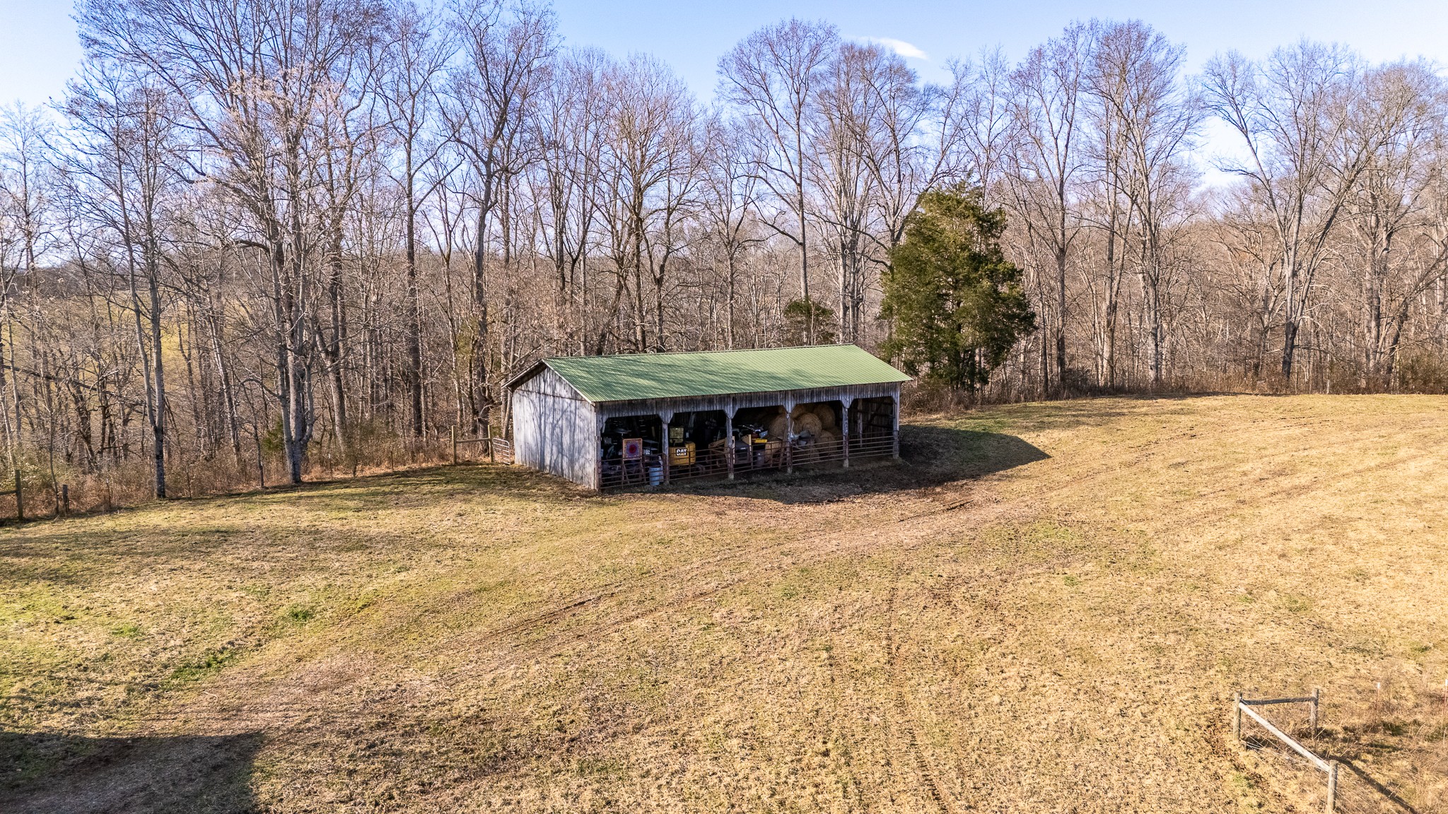 1545 Blue Springs Road Sparta, TN 38583 - Photo 90 of 99 a view of a house with a yard and covered with snow
