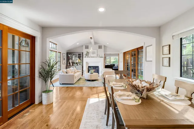 an aerial view of a house with a yard basket ball court and outdoor seating