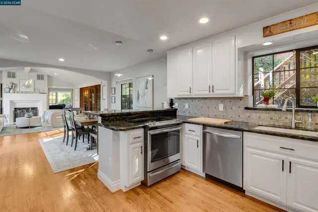 an aerial view of mountain and ocean