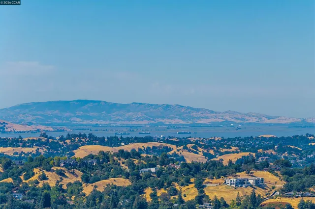 a view of a house with wooden stairs