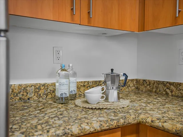 a close view of dining table chairs