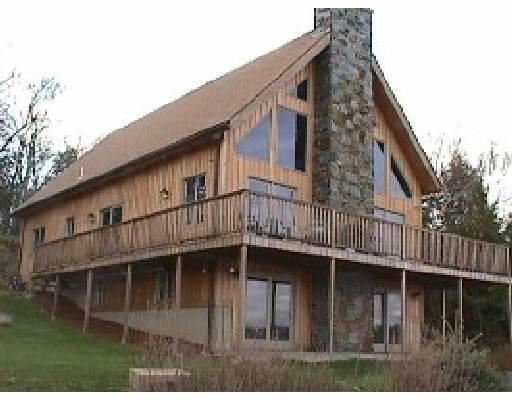 44 Mt Dan Road Sturbridge, MA 01518 - Photo 1 of 1 a view of a house with wooden deck