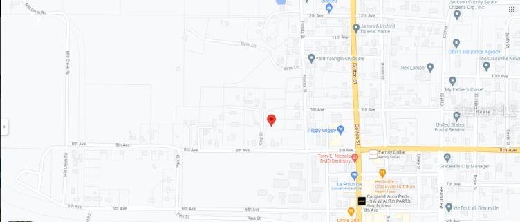 810 King Street Graceville, FL 32440 - Photo 6 of 8 a bathroom with a bathtub and a shower