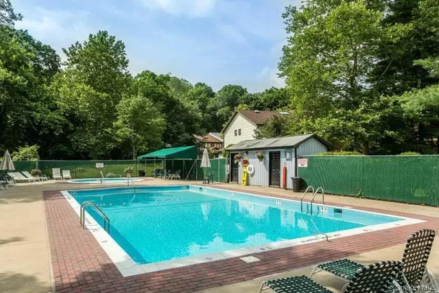 a view of an outdoor space and tennis court