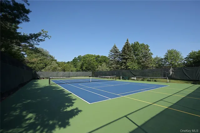 a view of a house with a park