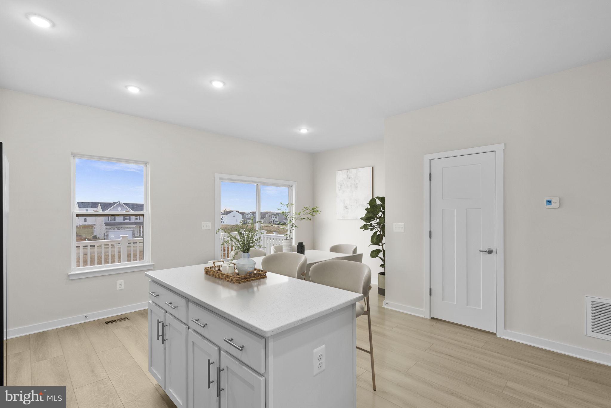 7 Sherman Avenue Ranson, WV 25438 - Photo 17 of 51 a kitchen with a sink cabinets and wooden floor
