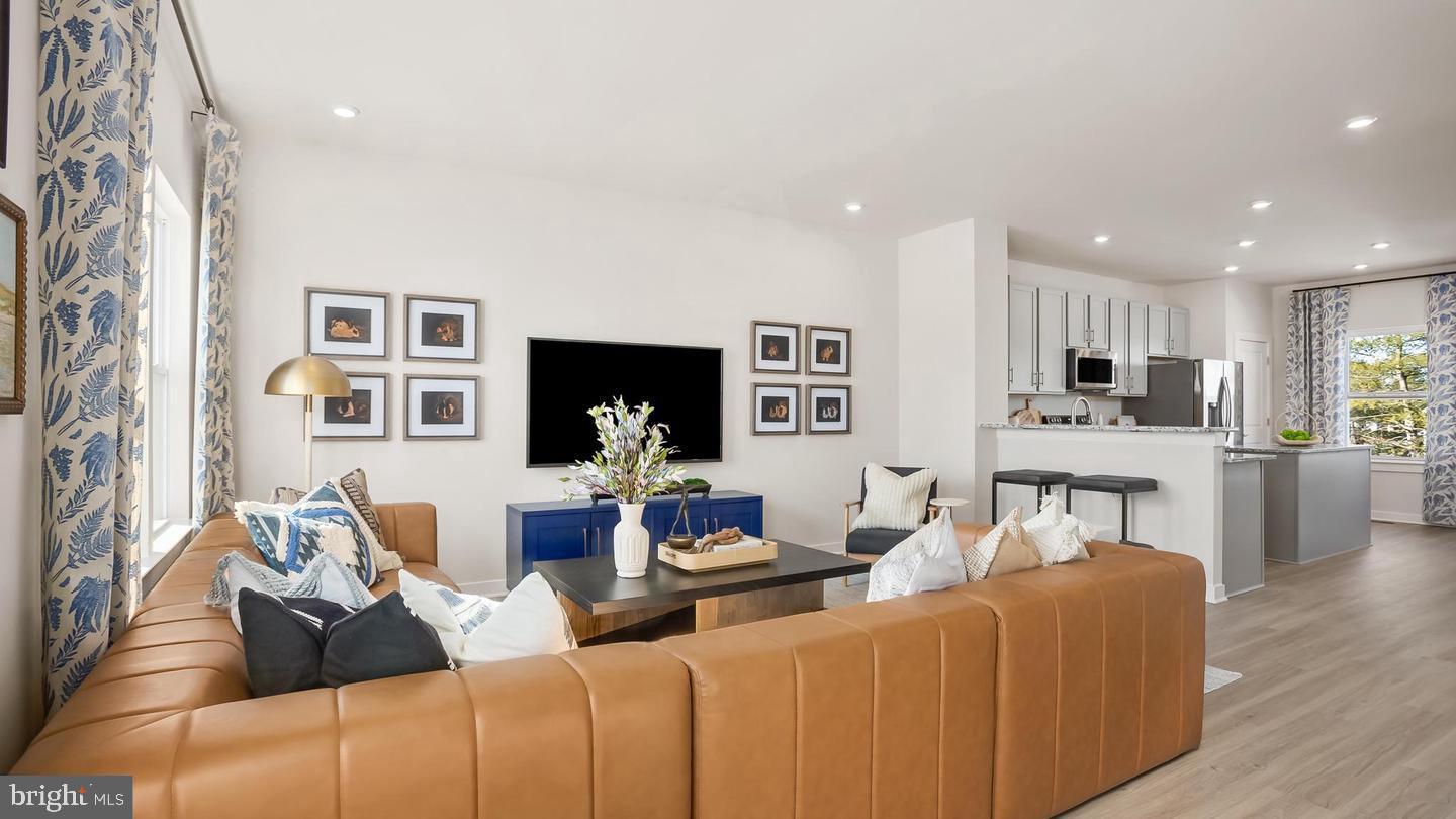 7 Sherman Avenue Ranson, WV 25438 - Photo 2 of 51 a living room with fireplace furniture and a flat screen tv
