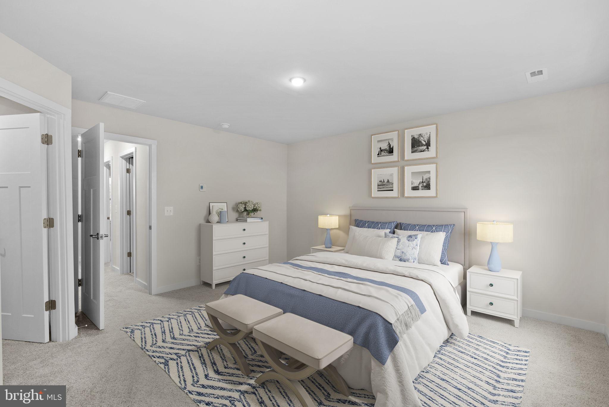 7 Sherman Avenue Ranson, WV 25438 - Photo 29 of 51 a bedroom with a bed and a view of bathroom