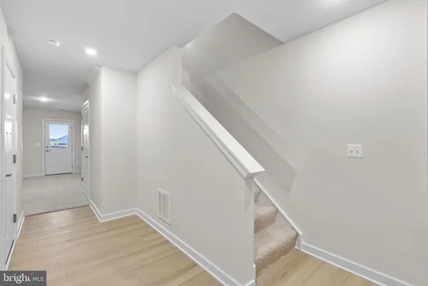 a view of hallway with stairs