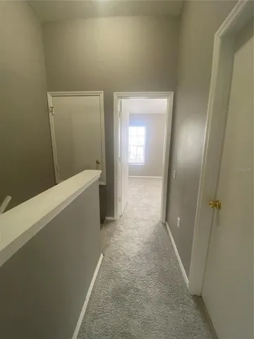 view of a room with wooden floor