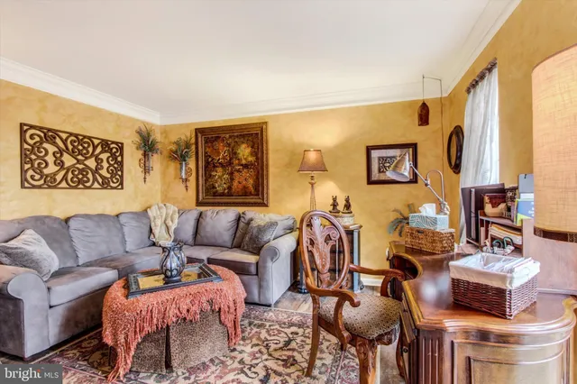 a living room with furniture and a couch