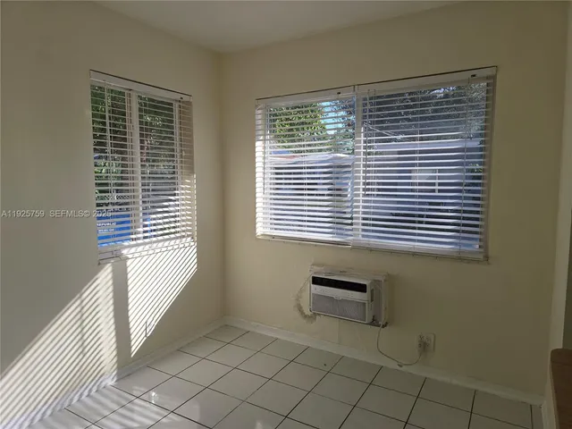 a bathroom with a toilet a sink and bathtub