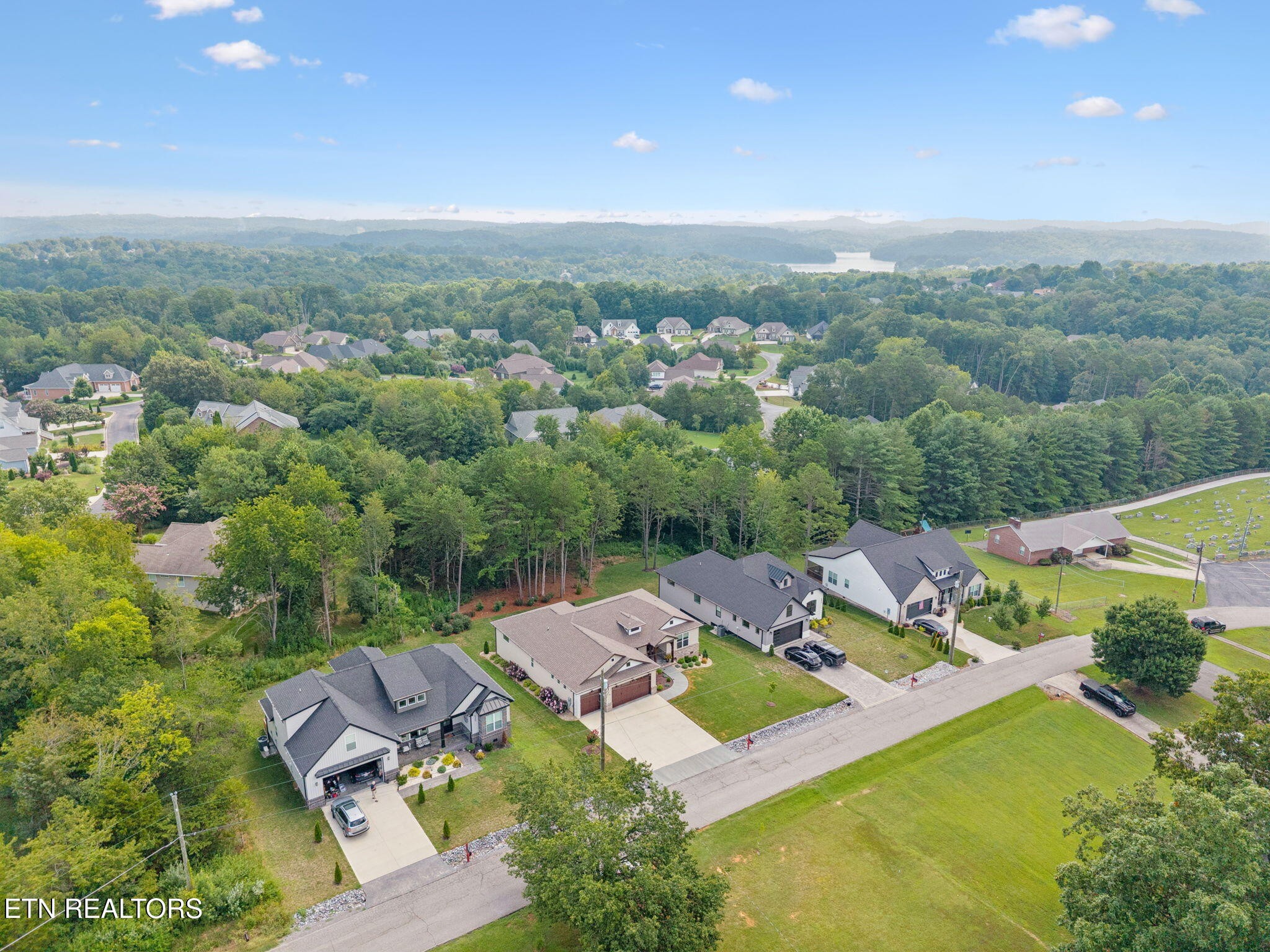 5389 Zion Ridge Road Loudon, TN 37774 - Photo 54 of 54 a view of a house with a yard