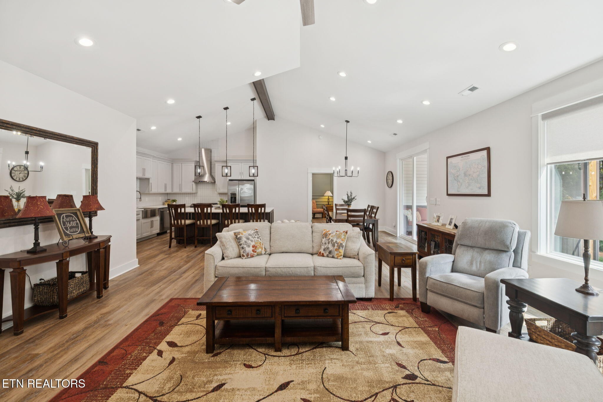 5389 Zion Ridge Road Loudon, TN 37774 - Photo 8 of 54 a living room with furniture and a dining table with kitchen view