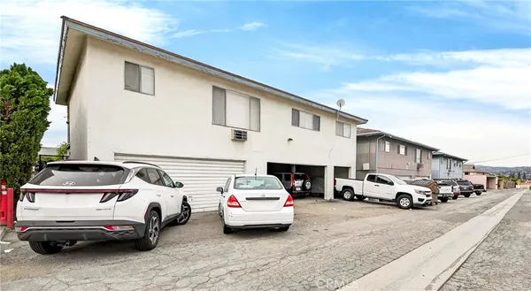 a car parked in front of a house