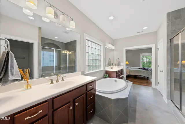 a bed room with a bed and a window