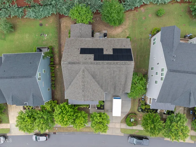a view of backyard with a garden and deck