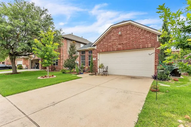 a bedroom with a bed and a television