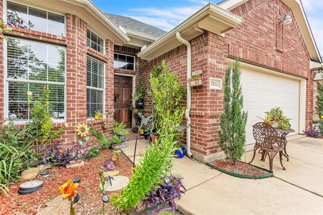 a front view of a house with a porch