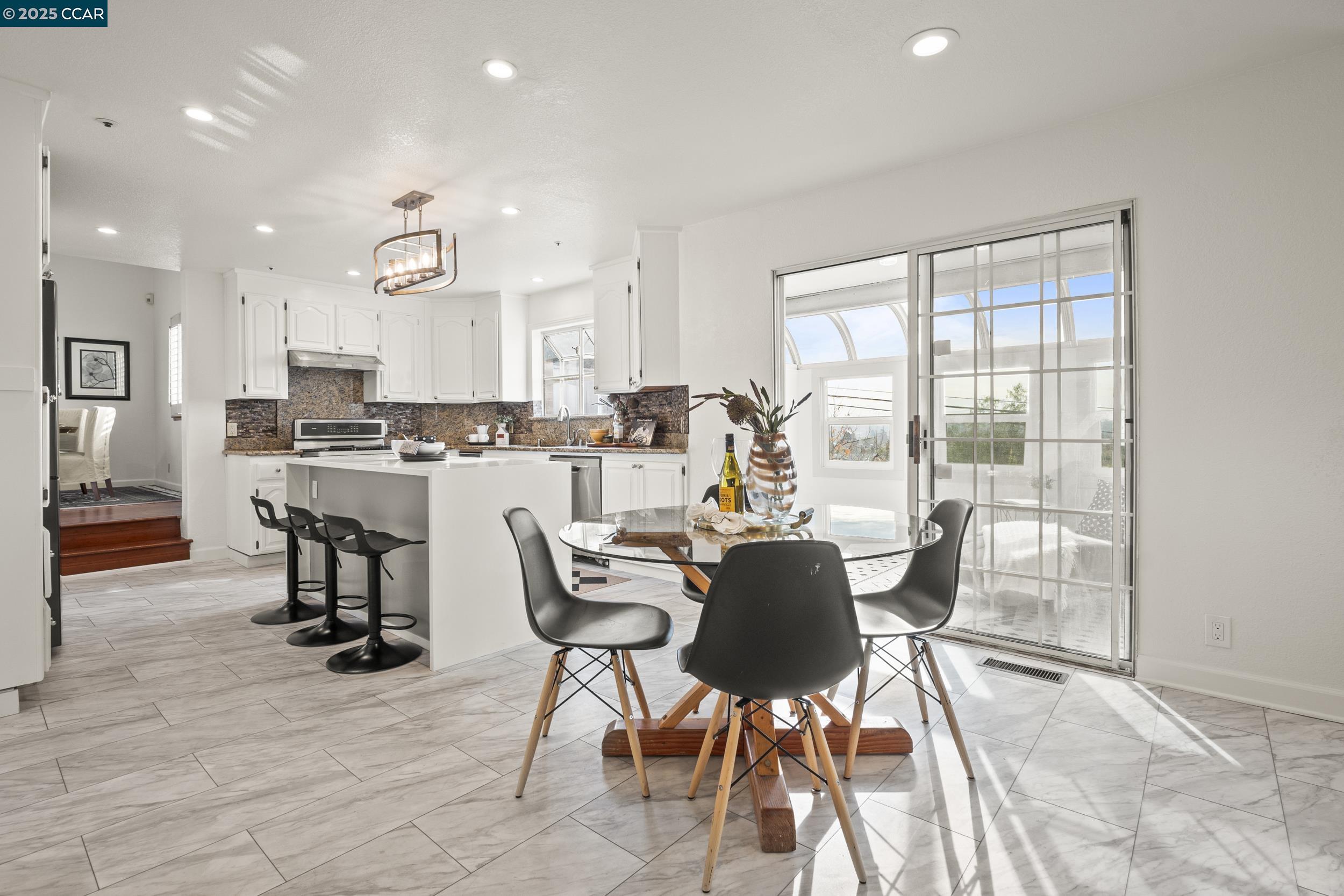419 Clark Drive Vallejo, CA 94591 - Photo 11 of 39 a view of a dining room with furniture and a large window