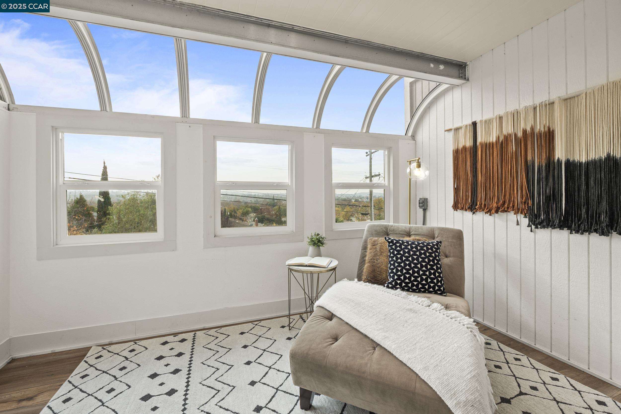 419 Clark Drive Vallejo, CA 94591 - Photo 16 of 39 a bedroom with a bed and wooden floor