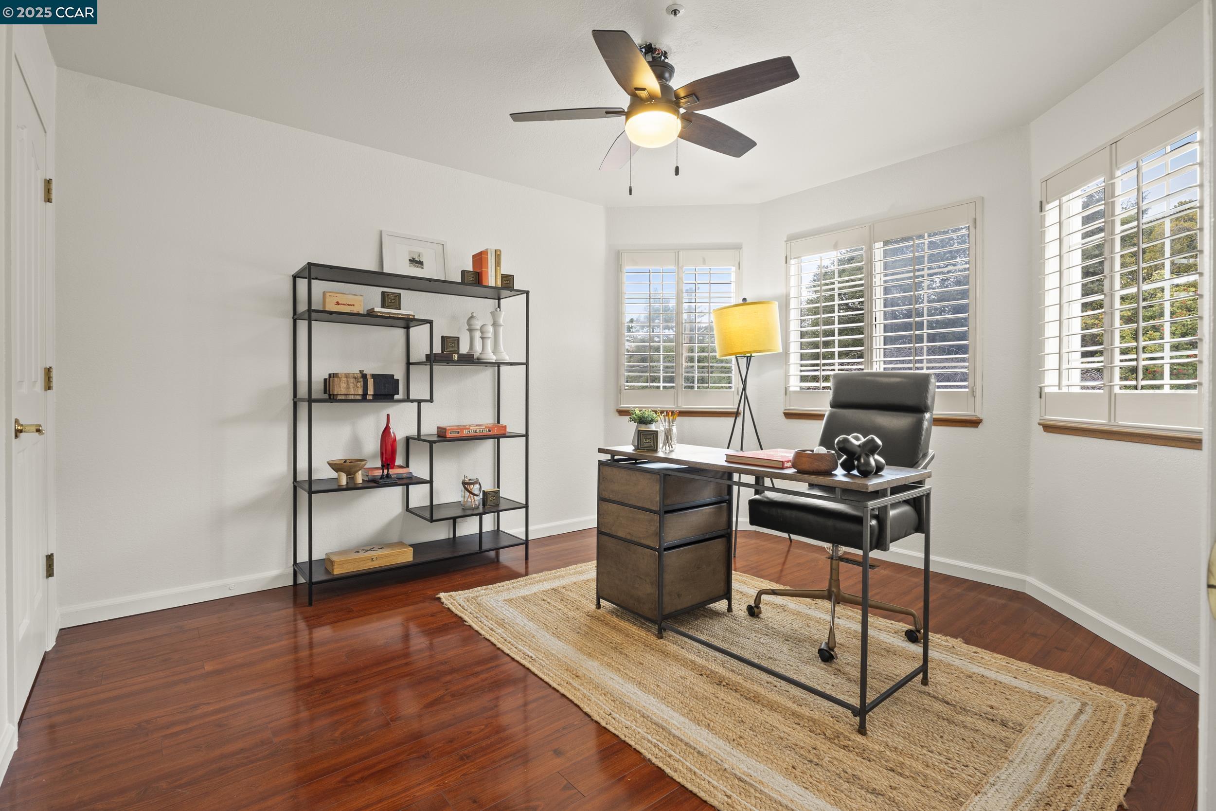 419 Clark Drive Vallejo, CA 94591 - Photo 17 of 39 a work room with furniture and wooden floor