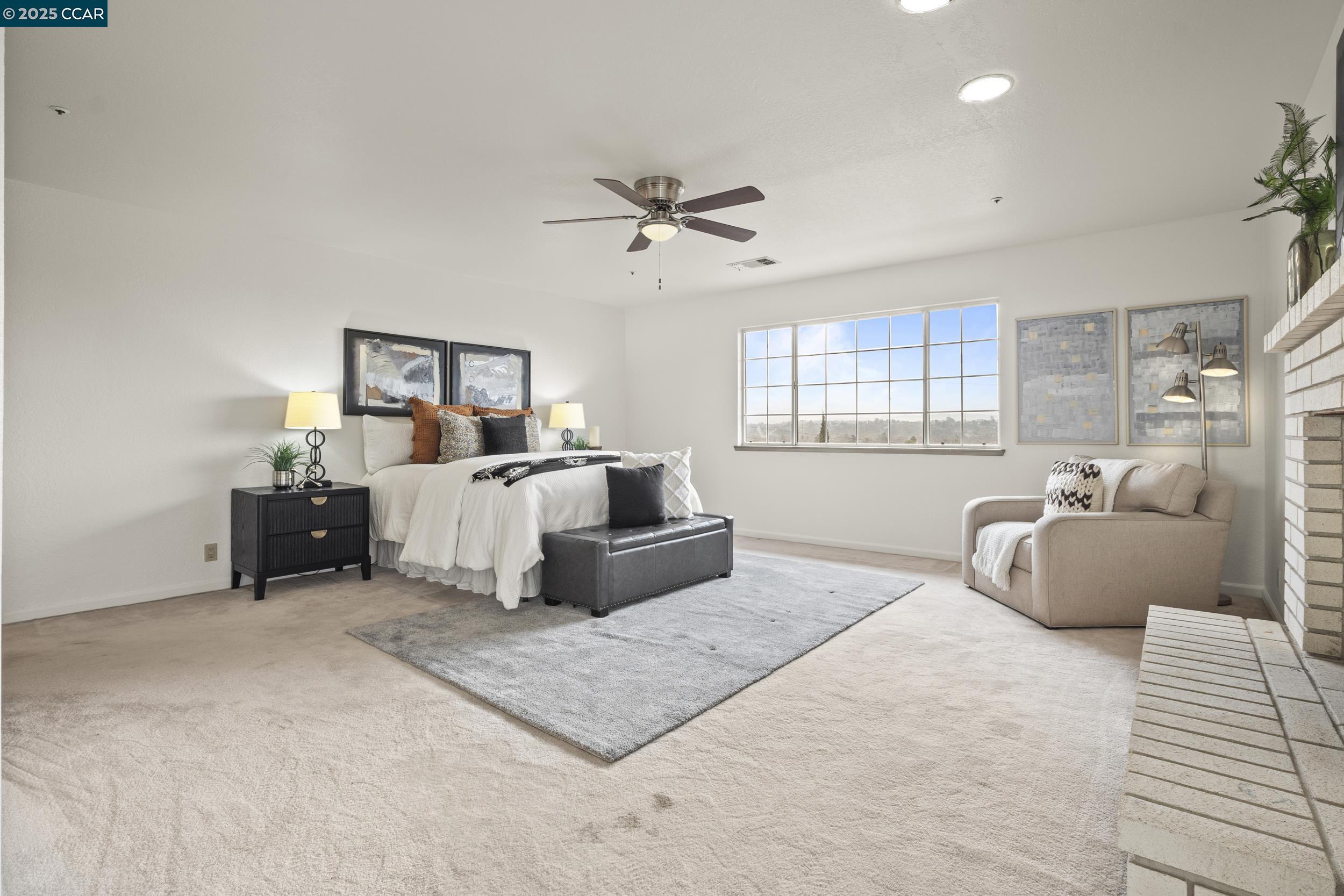 419 Clark Drive Vallejo, CA 94591 - Photo 21 of 39 a bedroom with bed and a couch