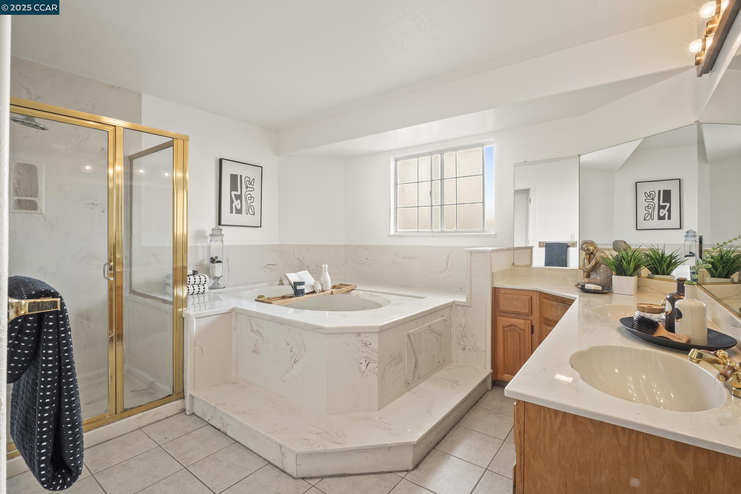 419 Clark Drive Vallejo, CA 94591 - Photo 23 of 39 a bathroom with a sink a vanity and a mirror