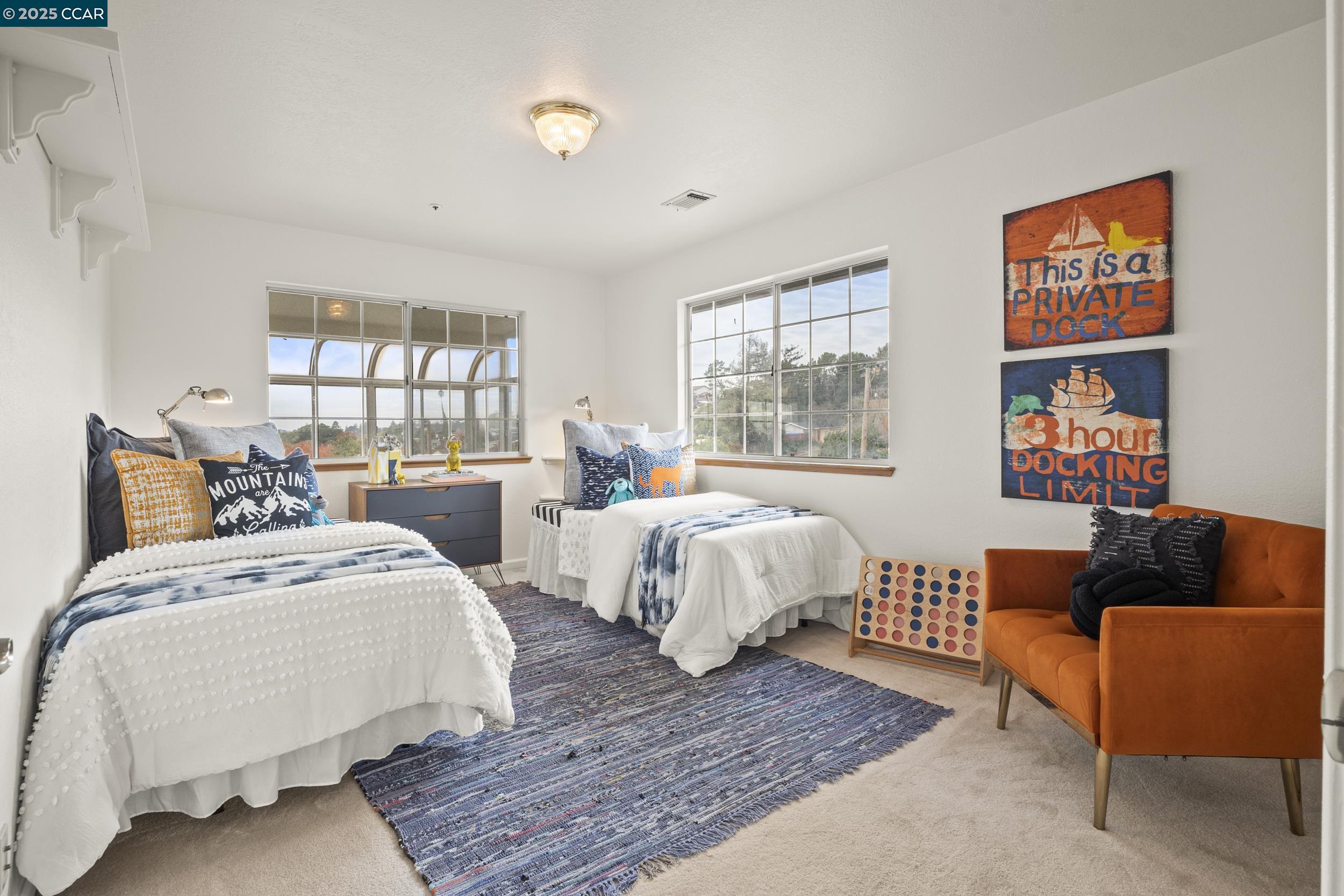 419 Clark Drive Vallejo, CA 94591 - Photo 28 of 39 a bedroom with two beds and a couch