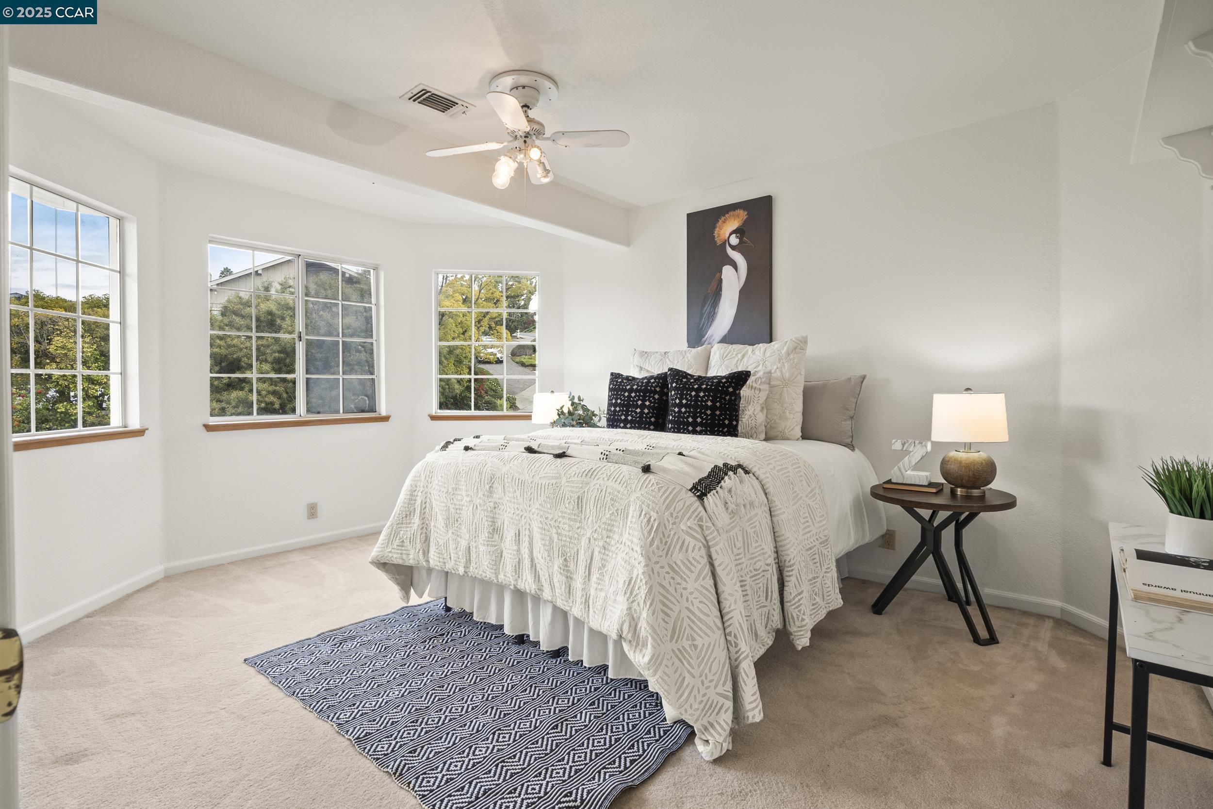 419 Clark Drive Vallejo, CA 94591 - Photo 29 of 39 a bed sitting in a bedroom next to a window