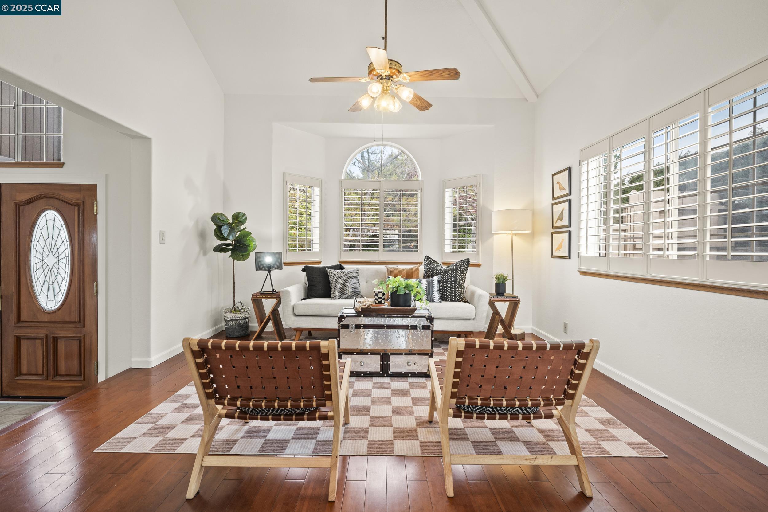 419 Clark Drive Vallejo, CA 94591 - Photo 5 of 39 a living room with fireplace furniture and a large window