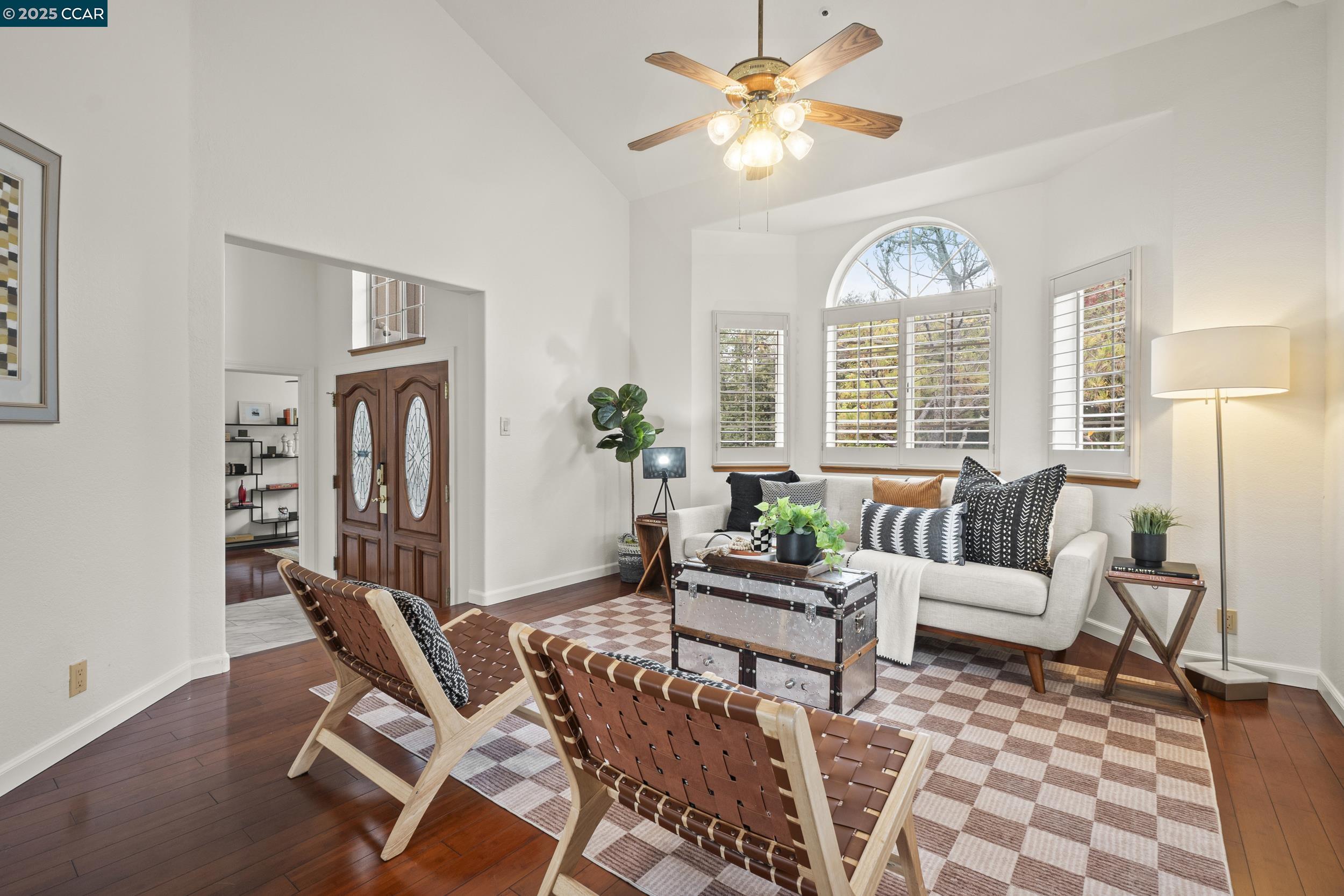 419 Clark Drive Vallejo, CA 94591 - Photo 6 of 39 a living room with furniture a fireplace and a large window