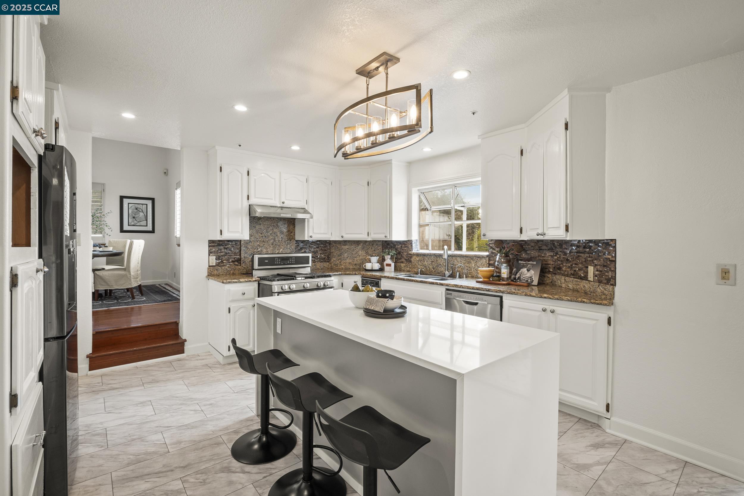 419 Clark Drive Vallejo, CA 94591 - Photo 9 of 39 a kitchen with a sink stainless steel appliances and cabinets