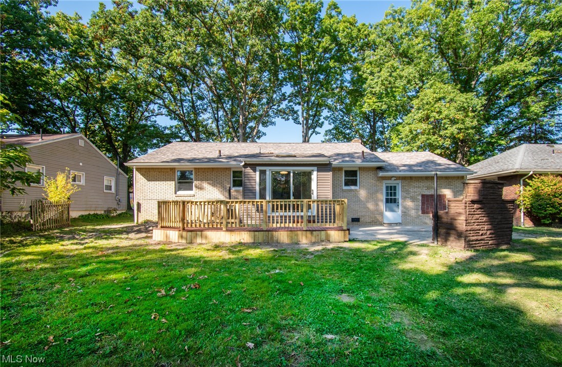 1097 South Meridian Road Youngstown, OH 44511 - Photo 29 of 29 Back of property with a deck and a yard