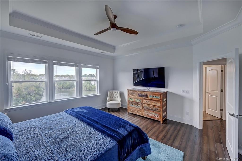 2227 Watermark Point Place Fort Mill, SC 29708 - Photo 24 of 43 a bedroom with a bed and a window