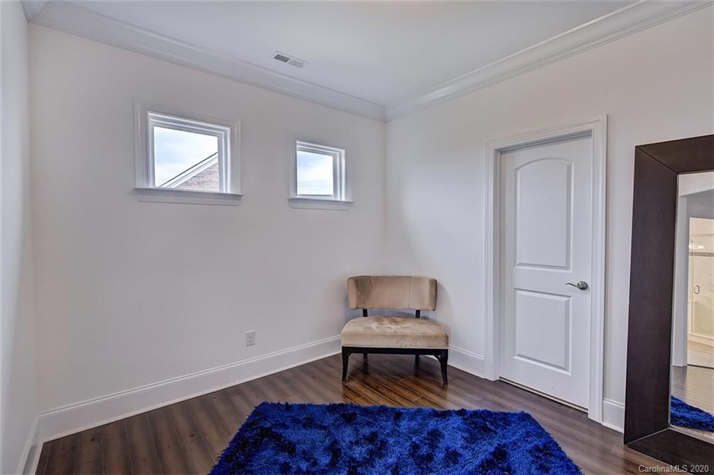 2227 Watermark Point Place Fort Mill, SC 29708 - Photo 27 of 43 a living room with furniture and a window
