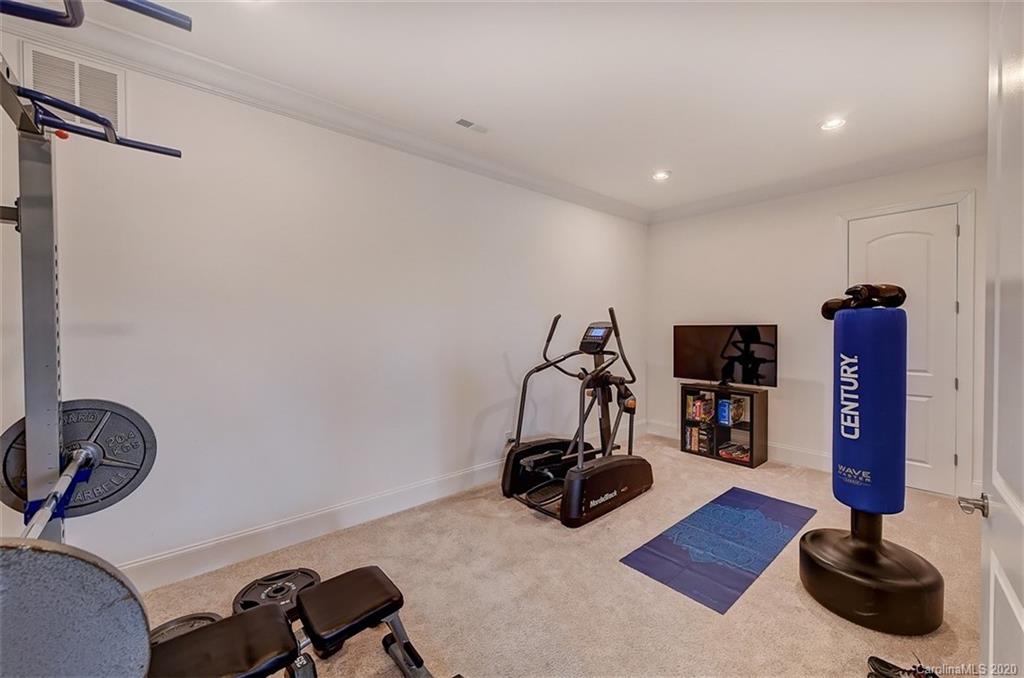 2227 Watermark Point Place Fort Mill, SC 29708 - Photo 35 of 43 a view of a room with gym equipment
