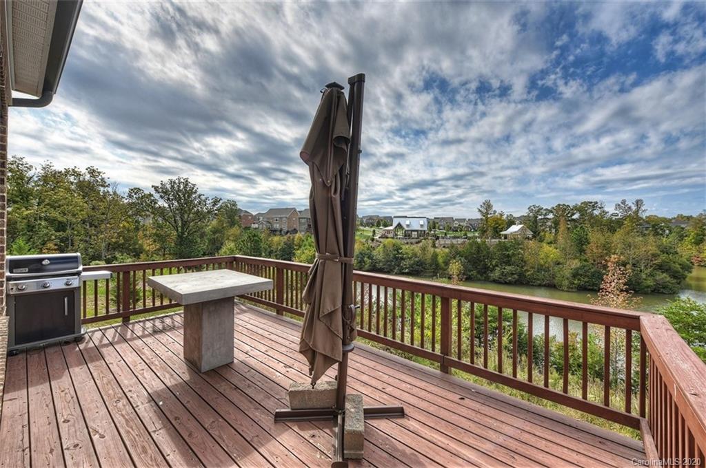 2227 Watermark Point Place Fort Mill, SC 29708 - Photo 39 of 43 a balcony with wooden floor and outdoor seating