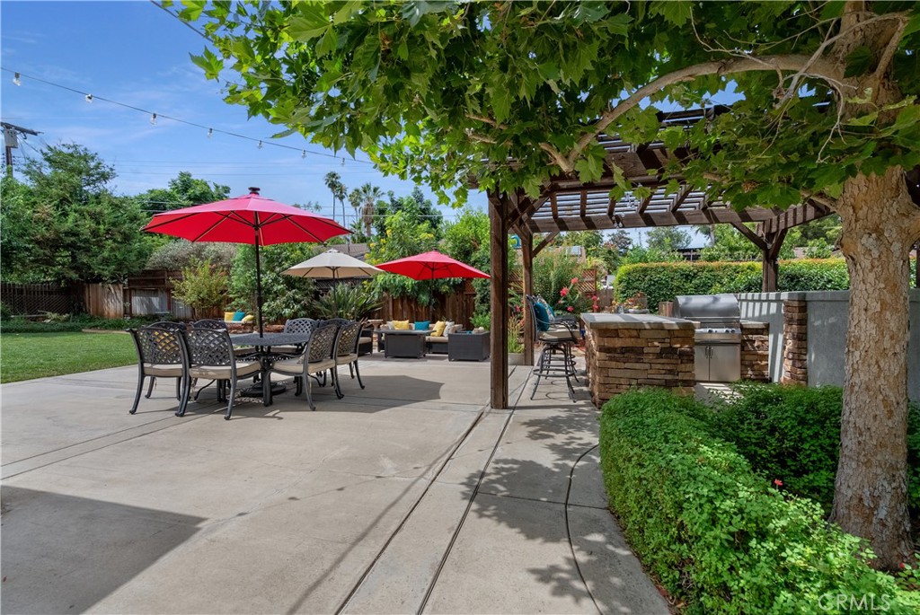 5407 Telefair Way Riverside, CA 92506 - Photo 27 of 35 an outdoor space with patio furniture and white umbrellas