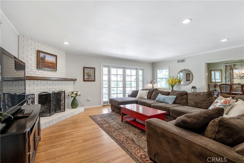 5407 Telefair Way Riverside, CA 92506 - Photo 3 of 35 a living room with furniture and fireplace