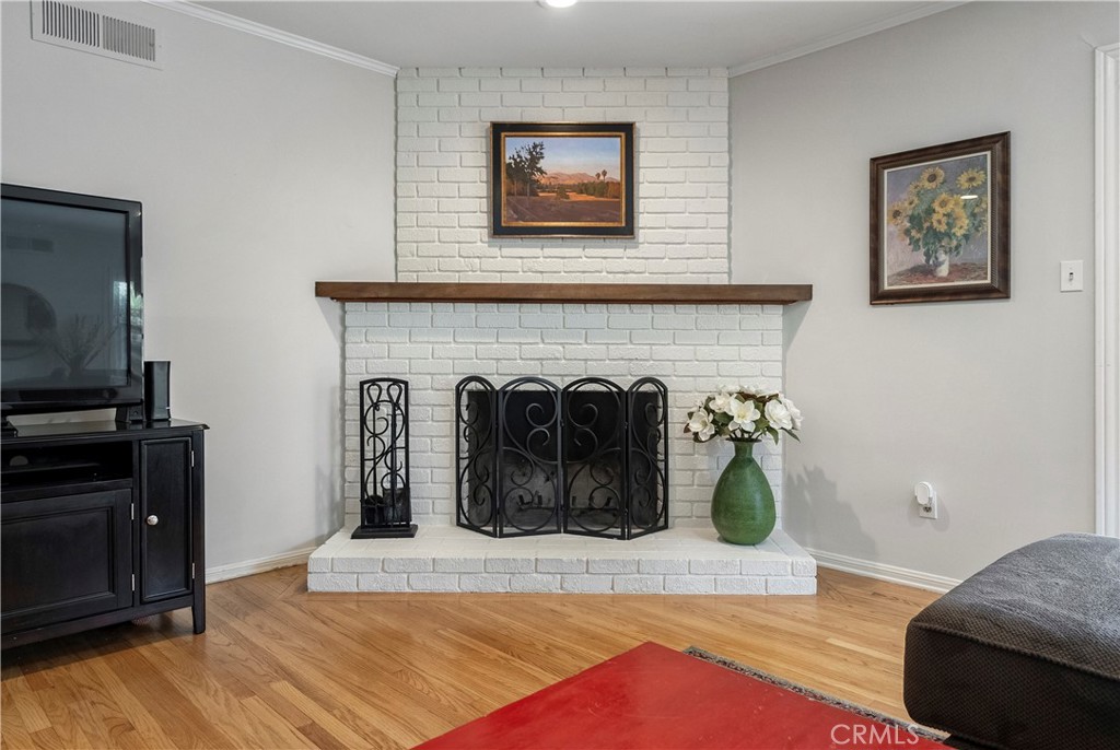 5407 Telefair Way Riverside, CA 92506 - Photo 4 of 35 a living room with furniture and a fireplace