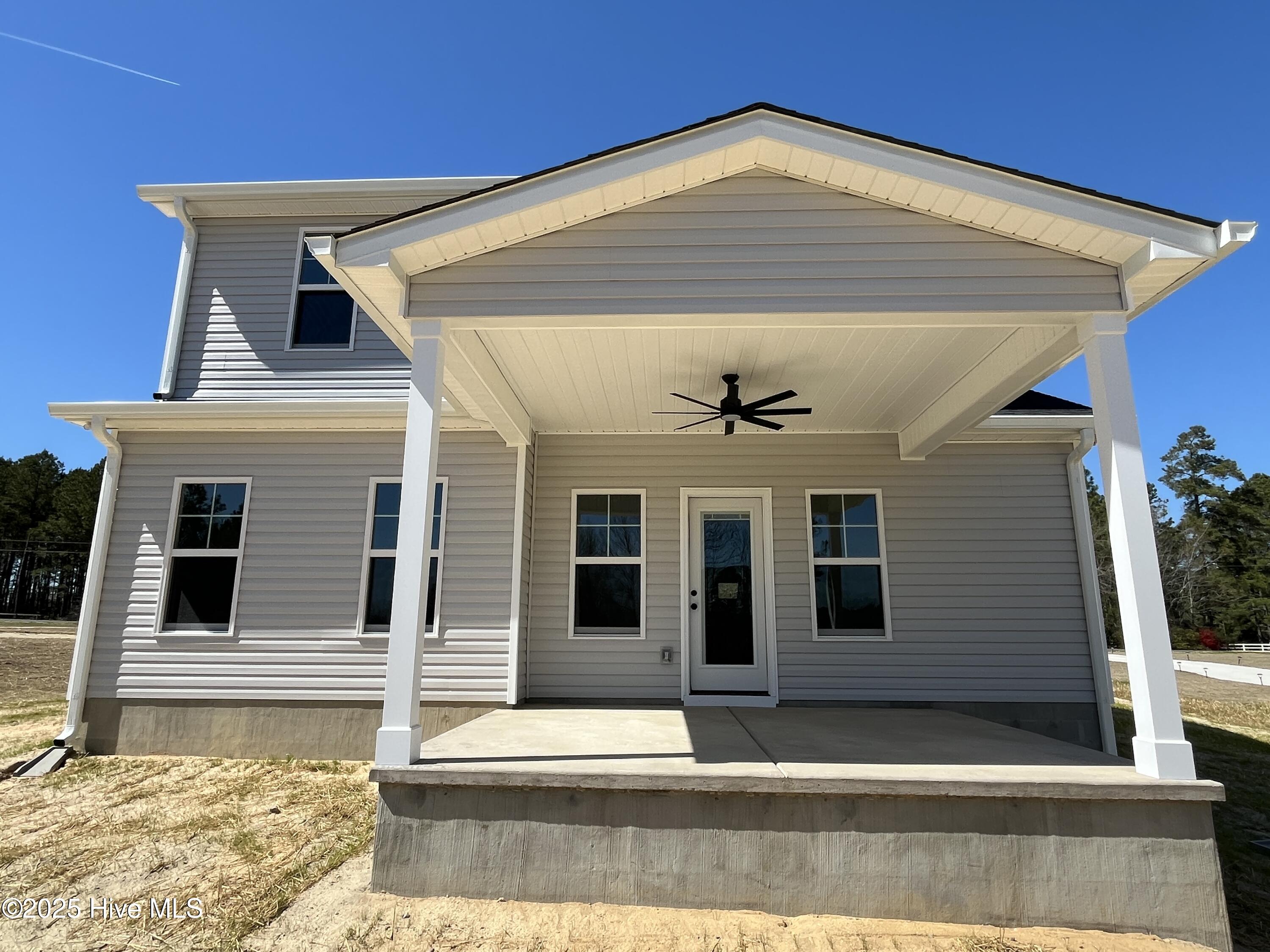 1631 Reservation Road Aberdeen, NC 28315 - Photo 14 of 58 Elevated and covered back porch with fan