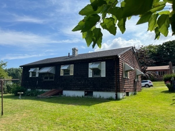 271 Bailey Street Fall River, MA 02724 - Photo 2 of 10 a front view of a house with a yard