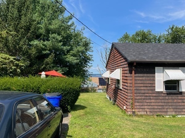271 Bailey Street Fall River, MA 02724 - Photo 3 of 10 a backyard of a house with seating space