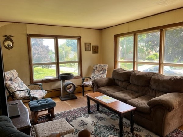 271 Bailey Street Fall River, MA 02724 - Photo 7 of 10 a living room with furniture and a large window