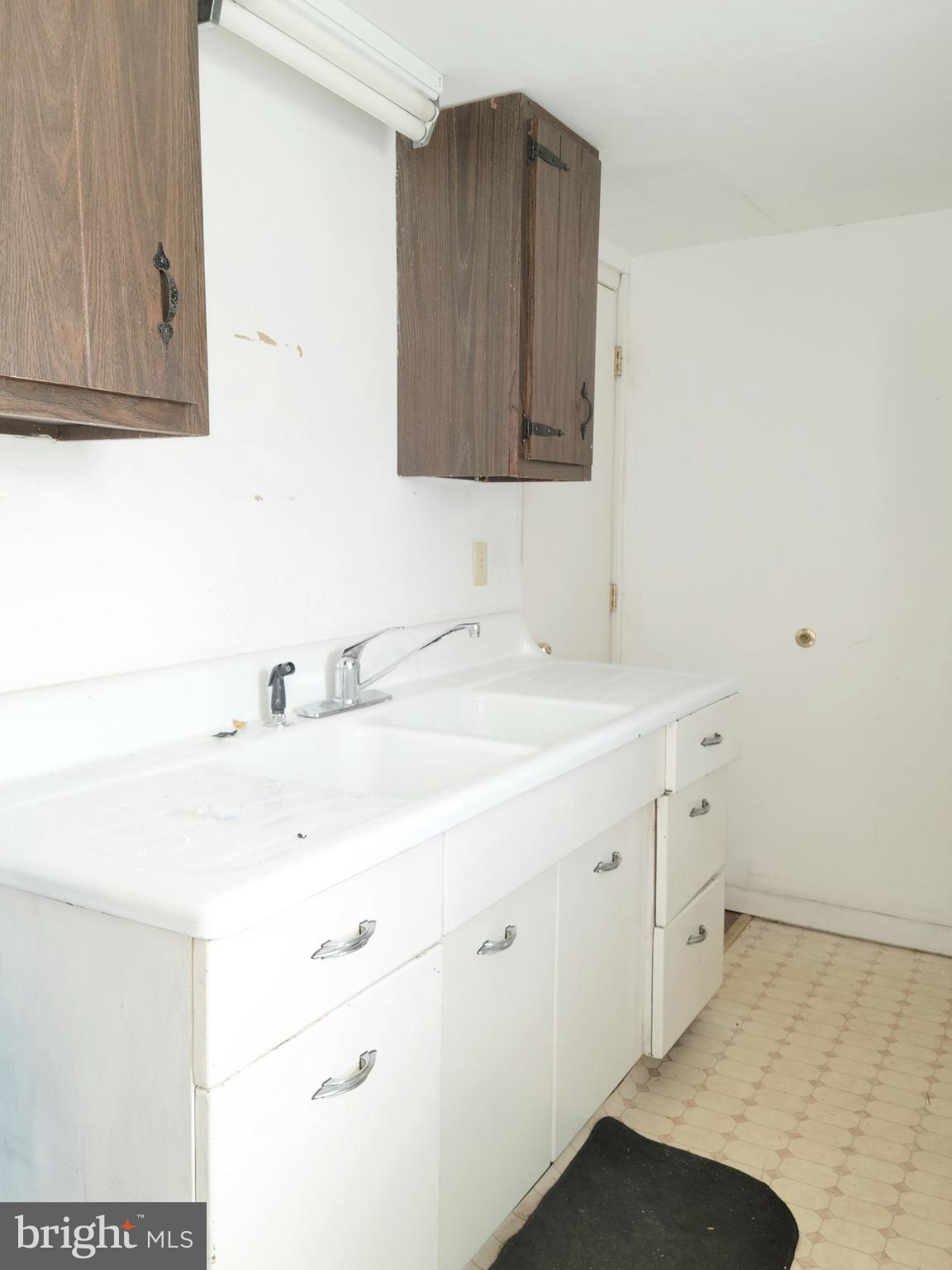 902 Laurel Road Lindenwold, NJ 08021 - Photo 8 of 22 a bathroom with a sink and a mirror
