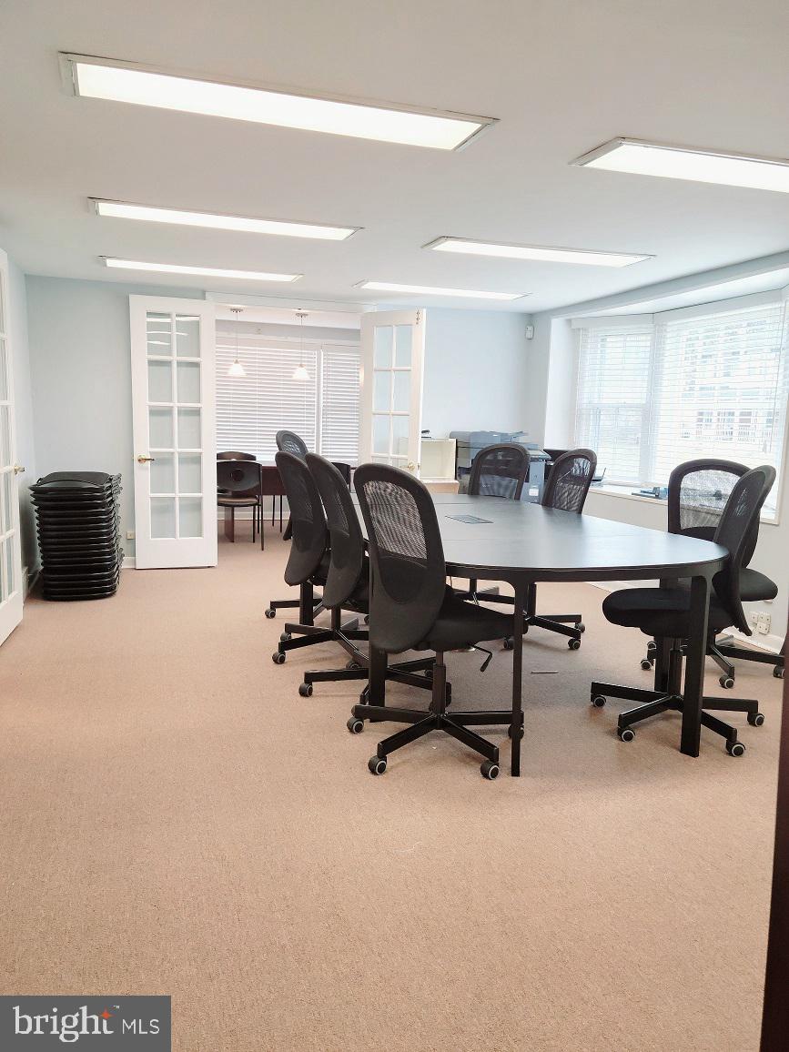 902 Laurel Road Lindenwold, NJ 08021 - Photo 9 of 22 a view of a workspace with furniture and a window